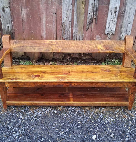 Wood dining bench with back and armrests. Reclaimed wood bench