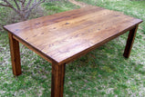 Wormy chestnut farm table for dining with antique design