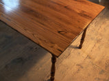 Antique farm table made of wormy chestnut