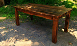 Antique farmhouse wooden table for dining made of wormy chestnut