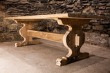 Trestle table for dining made of reclaimed barn wood
